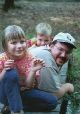 Dad with kids on the bridge