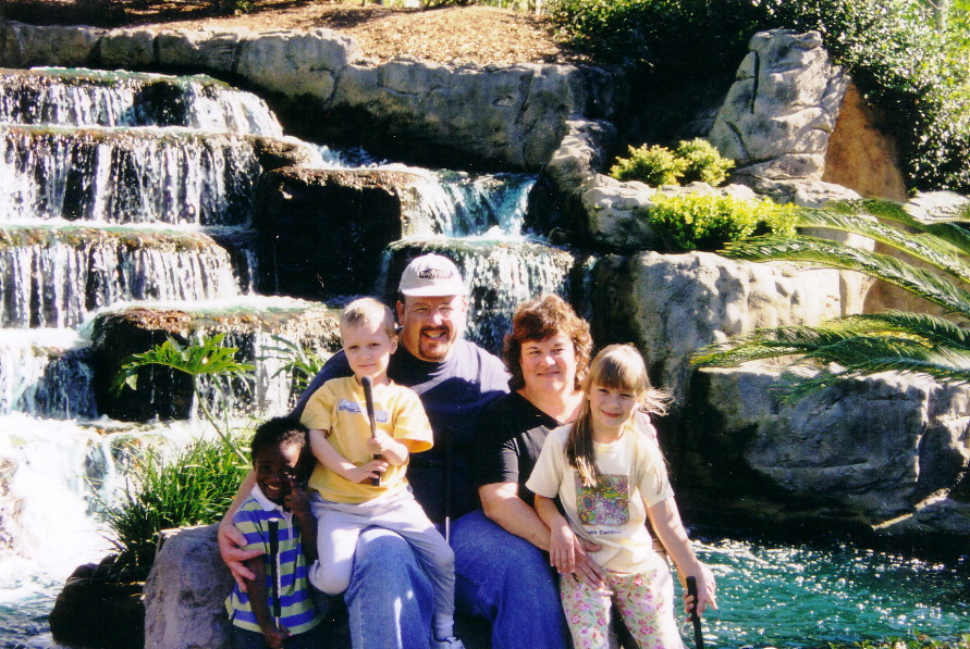 The whole family (plus Sam) at Pirate's Cove miniature golf